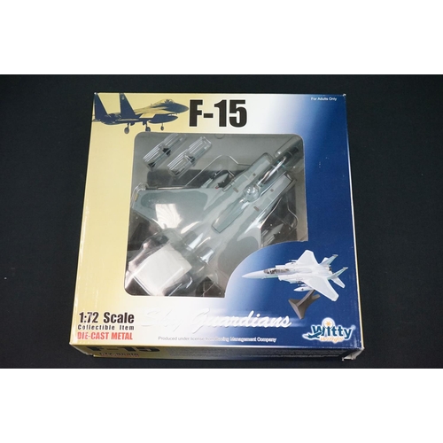 1033 - Four boxed 1/72 Witty Wings diecast models to include SU-27, F-15, Polish Air Force MiG-29UB & MI 17... 