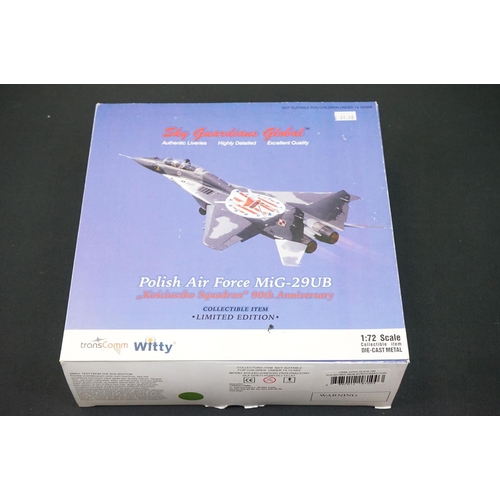 1033 - Four boxed 1/72 Witty Wings diecast models to include SU-27, F-15, Polish Air Force MiG-29UB & MI 17... 