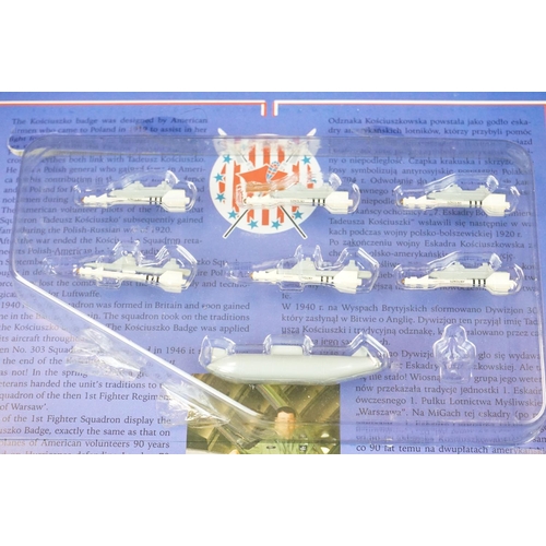 1033 - Four boxed 1/72 Witty Wings diecast models to include SU-27, F-15, Polish Air Force MiG-29UB & MI 17... 