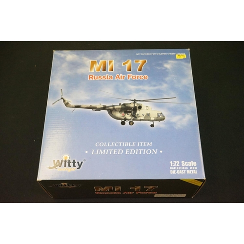 1033 - Four boxed 1/72 Witty Wings diecast models to include SU-27, F-15, Polish Air Force MiG-29UB & MI 17... 