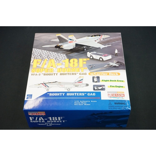 1049 - Four boxed Dragon Warbirds Series diecast models to include 50302 F/A-18F Super Hornet, 50148 Boeing... 