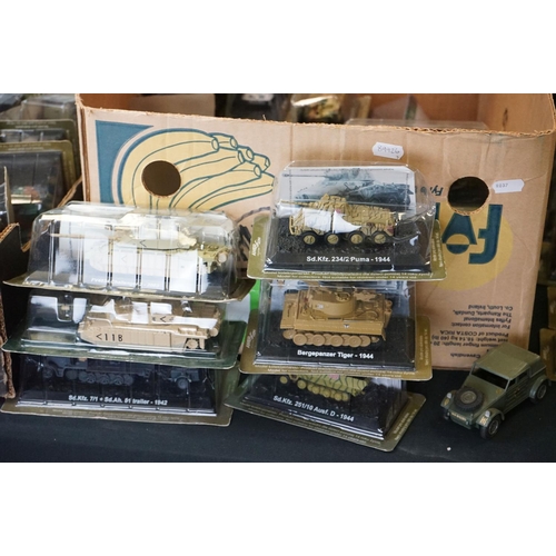 1052 - Collection of around 66 cased Amer Military Vehicles diecast models plus a quantity of associated ma... 