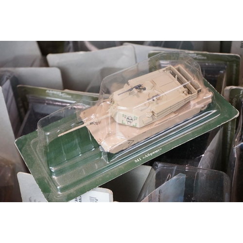 1052 - Collection of around 66 cased Amer Military Vehicles diecast models plus a quantity of associated ma... 