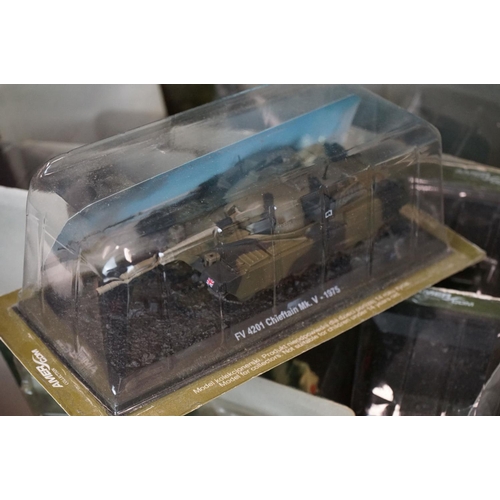 1052 - Collection of around 66 cased Amer Military Vehicles diecast models plus a quantity of associated ma... 