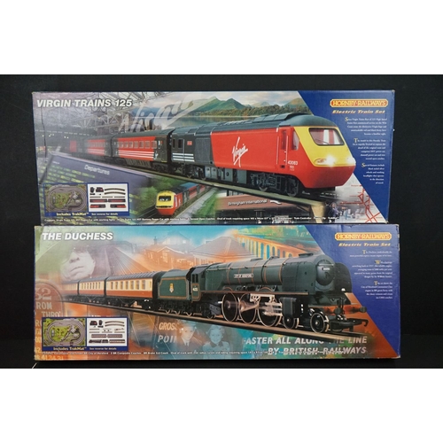 164 - Two boxed Hornby OO gauge electric train sets to include R1004 The Duchess and R1011 Virgin Trains 1... 