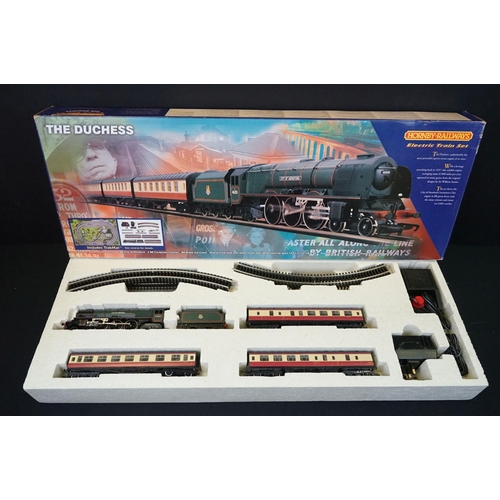 164 - Two boxed Hornby OO gauge electric train sets to include R1004 The Duchess and R1011 Virgin Trains 1... 