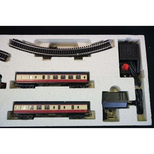 164 - Two boxed Hornby OO gauge electric train sets to include R1004 The Duchess and R1011 Virgin Trains 1... 