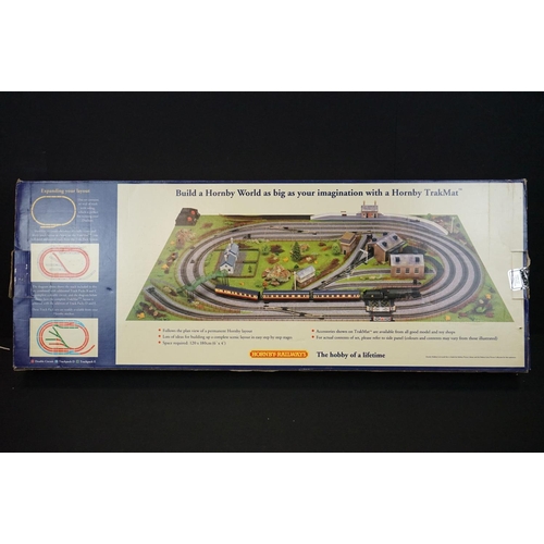 164 - Two boxed Hornby OO gauge electric train sets to include R1004 The Duchess and R1011 Virgin Trains 1... 