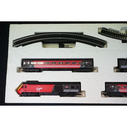 164 - Two boxed Hornby OO gauge electric train sets to include R1004 The Duchess and R1011 Virgin Trains 1... 