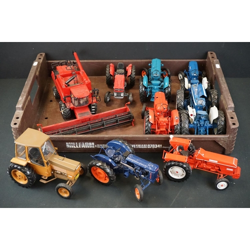 1064 - Nine diecast farming models featuring mainly Universal Hobbies tractors and a Britains Case 8120 Com... 