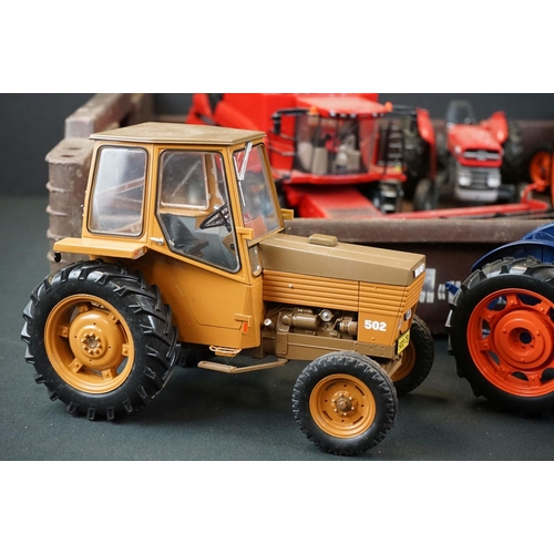 1064 - Nine diecast farming models featuring mainly Universal Hobbies tractors and a Britains Case 8120 Com... 