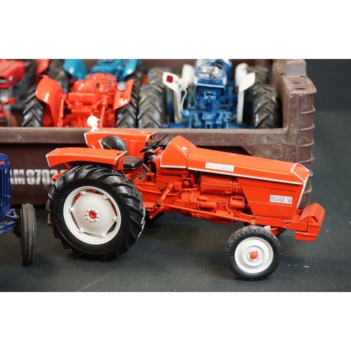 1064 - Nine diecast farming models featuring mainly Universal Hobbies tractors and a Britains Case 8120 Com... 