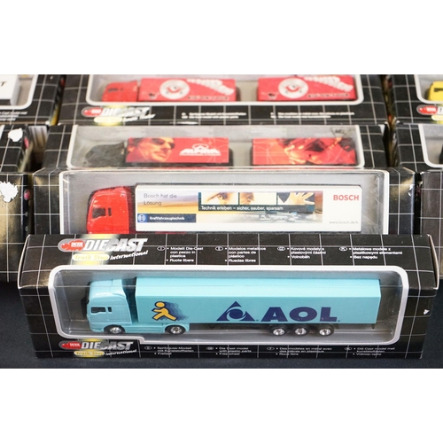 1067 - 34 Boxed Dickie Spielzeug Truck Stop diecast models to include double trailer, trucker service and i... 