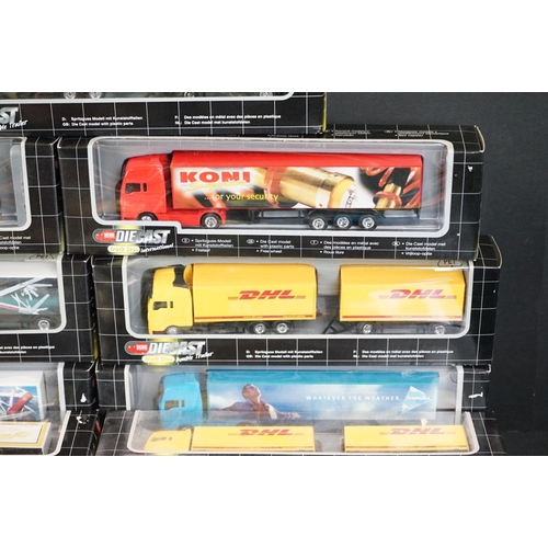 1067 - 34 Boxed Dickie Spielzeug Truck Stop diecast models to include double trailer, trucker service and i... 