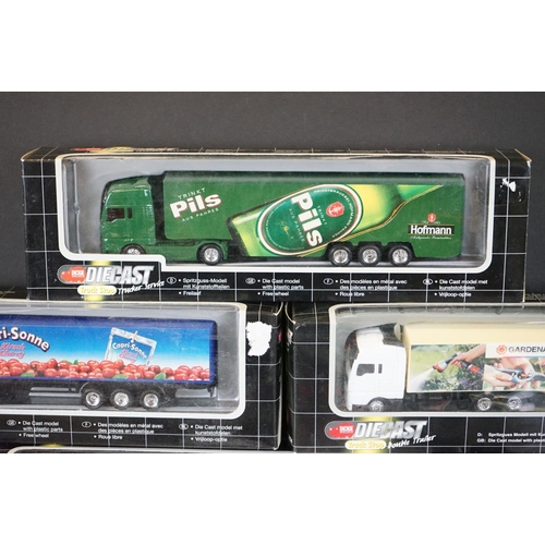 1067 - 34 Boxed Dickie Spielzeug Truck Stop diecast models to include double trailer, trucker service and i... 