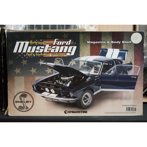 1070 - 98 DeAgostini 'Build Your Own Ford Mustang' magazines with parts, majority unopened, plus a boxed Bu... 