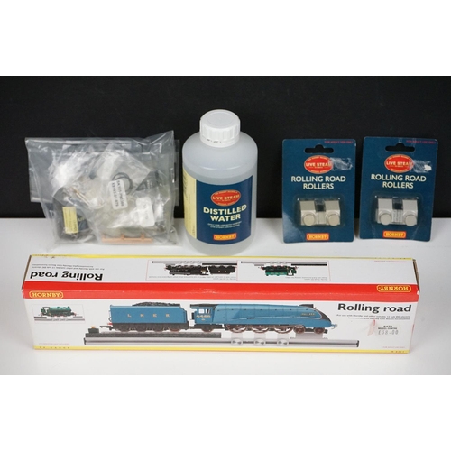 137 - Boxed Hornby R8211 Rolling Road plus additional accessories to include 2 x carded Rolling Road Rolle... 