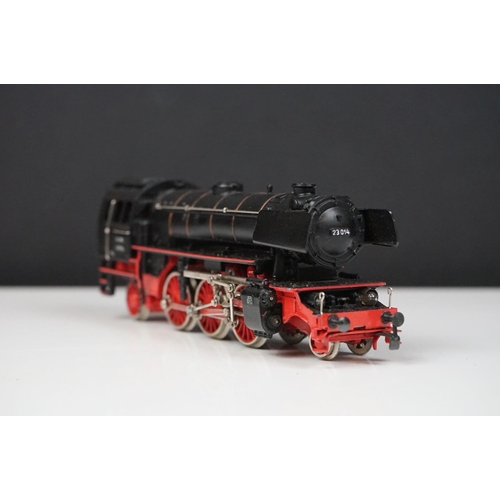 146 - Two HO gauge Marklin locomotives to include 2-6-2 23014 and 0-6-0 1295 (play worn)