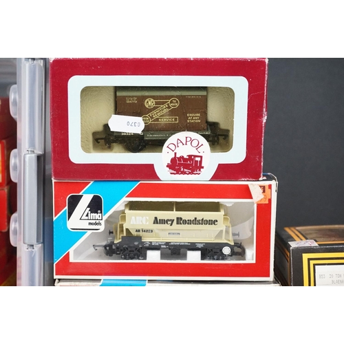 149 - Around 42 boxed items of OO gauge rolling stock to include wagons & vans featuring Hornby, Triang, L... 