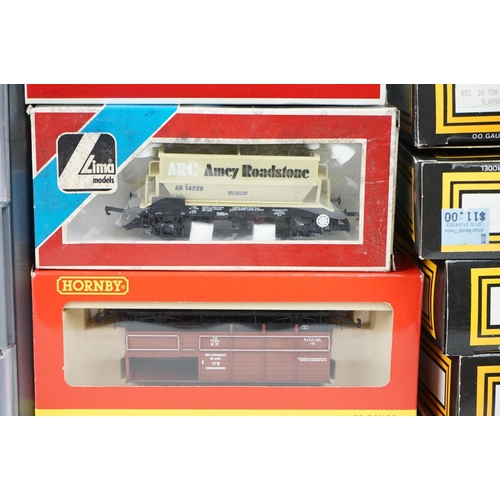 149 - Around 42 boxed items of OO gauge rolling stock to include wagons & vans featuring Hornby, Triang, L... 