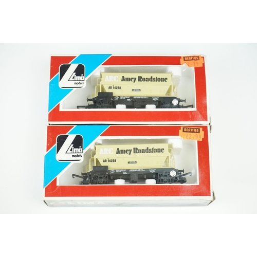 149 - Around 42 boxed items of OO gauge rolling stock to include wagons & vans featuring Hornby, Triang, L... 