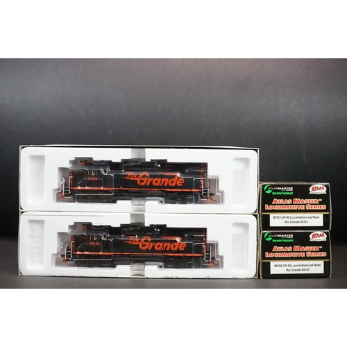 202 - Two boxed Atlas Master Locomotive Series HO gauge GP-40 Low Nose Rio Grande locomotives to include #... 