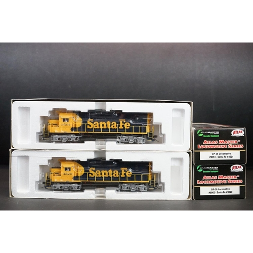 203 - Two boxed Atlas Master Locomotive Series HO gauge GP-38 Santa Fe Locomotives to include #3520 and #3... 