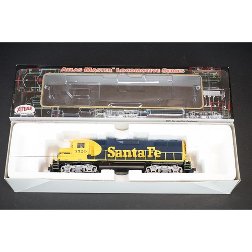 203 - Two boxed Atlas Master Locomotive Series HO gauge GP-38 Santa Fe Locomotives to include #3520 and #3... 