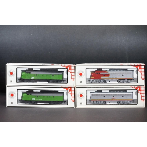 204 - Four boxed Stewart Hobbies HO gauge locomotives to include 9330 BN, 9170 Santa Fe, 9171 Santa Fe and... 