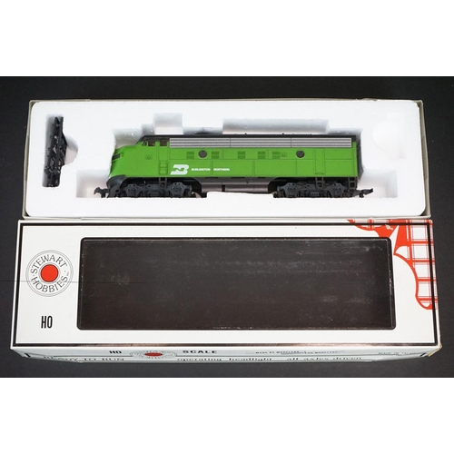 204 - Four boxed Stewart Hobbies HO gauge locomotives to include 9330 BN, 9170 Santa Fe, 9171 Santa Fe and... 