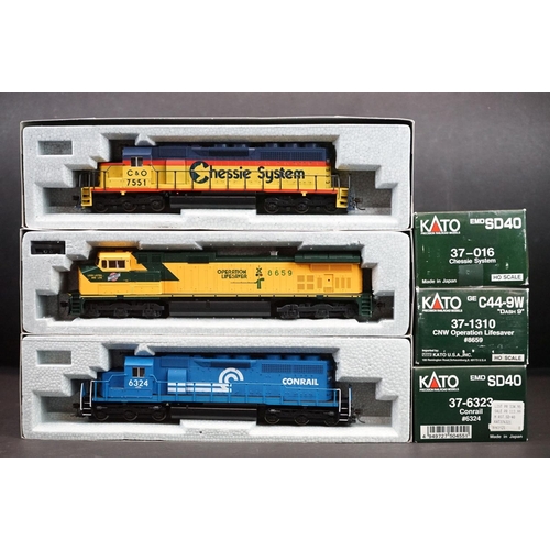 229 - Three boxed Kato HO gauge locomotives to include 37-6323 Conrail #6324, 37-1310 CNW Operation Lifesa... 