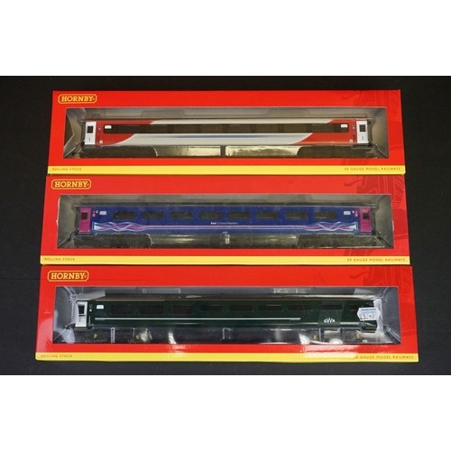 236 - 21 Boxed Hornby OO gauge items of rolling stock to include R4634A BR InterCity Mk3 Std open Coach, R... 