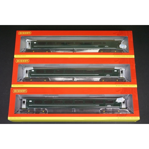 236 - 21 Boxed Hornby OO gauge items of rolling stock to include R4634A BR InterCity Mk3 Std open Coach, R... 