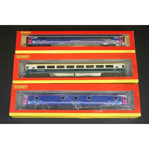 236 - 21 Boxed Hornby OO gauge items of rolling stock to include R4634A BR InterCity Mk3 Std open Coach, R... 