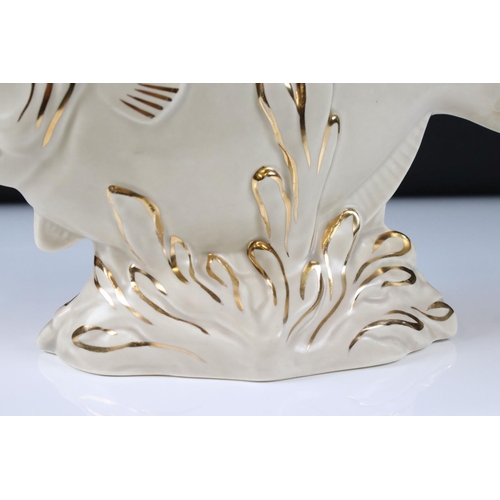 1 - Clarice Cliff Vase moulded as a fish, in a cream colourway with gold highlights, printed marks to ba... 