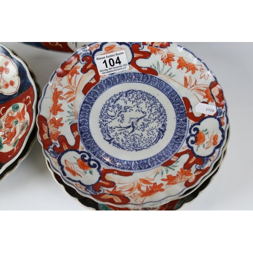 104 - Two Japanese Imari Chargers decorated with Cranes, 31cm diameter together with Five Japanese Imari F... 