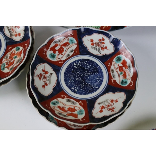 104 - Two Japanese Imari Chargers decorated with Cranes, 31cm diameter together with Five Japanese Imari F... 