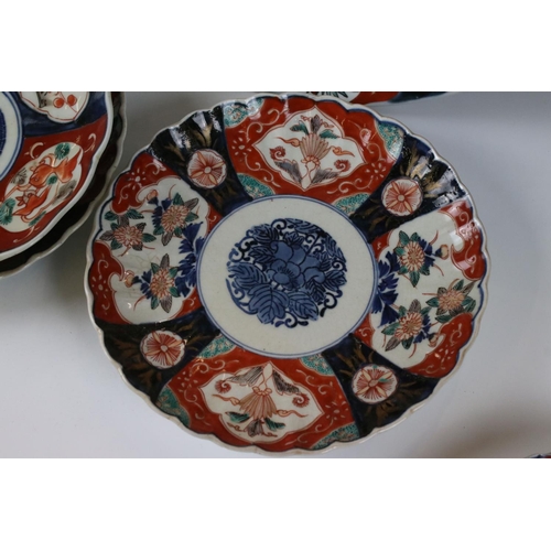 104 - Two Japanese Imari Chargers decorated with Cranes, 31cm diameter together with Five Japanese Imari F... 