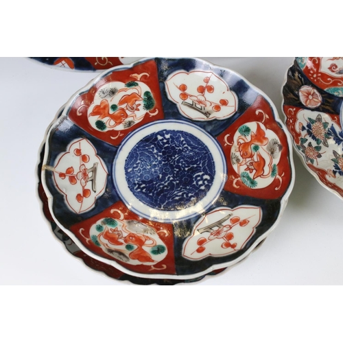 104 - Two Japanese Imari Chargers decorated with Cranes, 31cm diameter together with Five Japanese Imari F... 