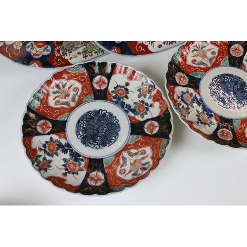 104 - Two Japanese Imari Chargers decorated with Cranes, 31cm diameter together with Five Japanese Imari F... 