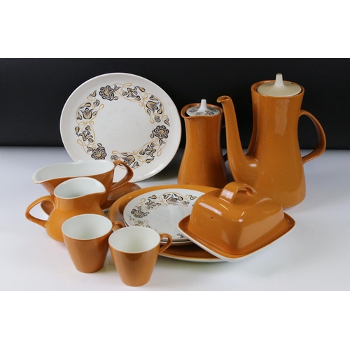 106 - Poole Pottery Dinner and Tea Ware decorated in two tone orange and white ground with a floral patter... 