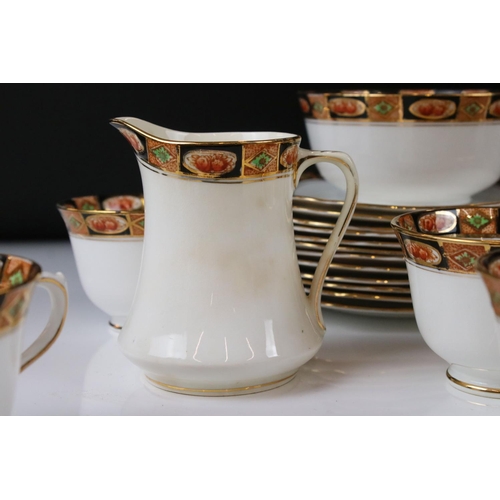 115 - Circa 1920 Art Deco period Royal Albert Crown China pattern # 4004 Imari design 36 piece tea service