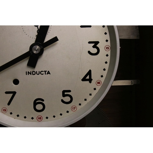 129 - Mid century Oak Cased ' Inducta ' Electric Clock, the 8.5