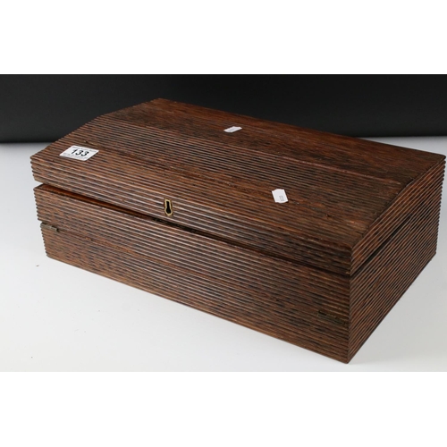 133 - Anglo Indian Reeded Snakewood Writing Slope Box, opening to a fitted interior with brown writing sur... 