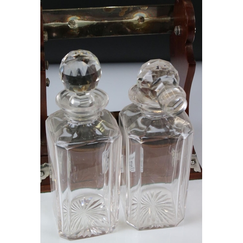 142 - Early 20th century Mahogany and Silver Plated ' Betjamann's Patent ' Two Bottle Tantalus, stamped to... 