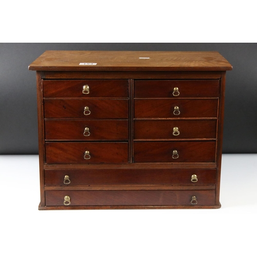 153 - 19th century tabletop specimen chest of ten drawers, 45cm wide x 34cm high