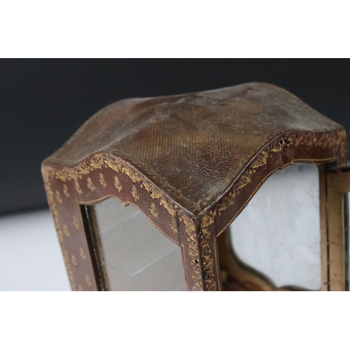 154 - 19th / Early 20th century Novelty Table Vitrine in the form of a Tooled Gilt Leather covered Sedan C... 