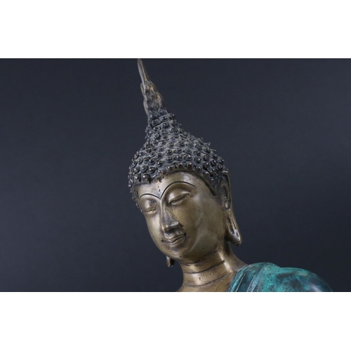 161 - Bronze part painted Buddha seated in the dhyanasana, 32cm high