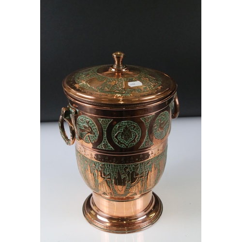 183 - Copper Lidded Urn with engraved Persian / Zoroastrian type decoration, two ringed handled, 35cm high