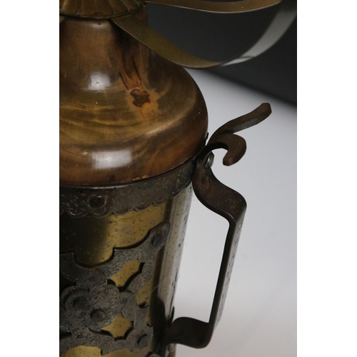 185 - Table Lamp, the metal wood effect base covered with a brass and white metal band, holding yellow gla... 